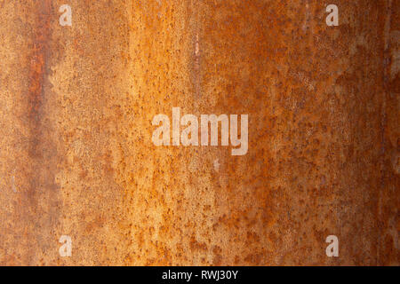 Old Distressed Brown Terracotta Copper Rusty Stone Background with Rough Texture Multicolored Inclusions. Stained Gradient Coarse Grainy Surface Stock Photo