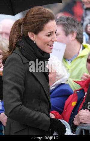 Blackpool, UK. 6th March 2019. The Duke and Duchess of Cambridge meeting members of the public on a wet day in Blackpool.  The Royals chatted to the public when they viewed the ‘Comedy Carpet’. The walkabout followed a visit to the Town’s most famous landmark, Blackpool Tower where they learned about the resort’s recent history, challenges and the investment and regeneration efforts that are underway. Credit: Paul Melling/Alamy Live News Stock Photo