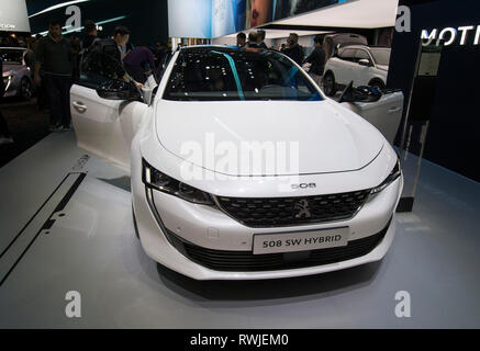 Geneva. 6th Mar, 2019. Photo taken on March 6, 2019 shows the New Peugeot 508 SW Hybrid at the 89th Geneva International Motor Show in Geneva, Switzerland. Electric cars and hybrid cars are highlights at this year's Geneva International Motor Show, which will open to the public from March 7 to 17. Credit: Xu Jinquan/Xinhua/Alamy Live News Stock Photo