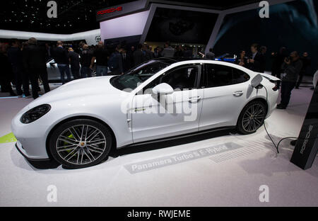 Geneva. 6th Mar, 2019. Photo taken on March 6, 2019 shows the Porsche Panamera Turbo S E-Hybrid at the 89th Geneva International Motor Show in Geneva, Switzerland. Electric cars and hybrid cars are highlights at this year's Geneva International Motor Show, which will open to the public from March 7 to 17. Credit: Xu Jinquan/Xinhua/Alamy Live News Stock Photo
