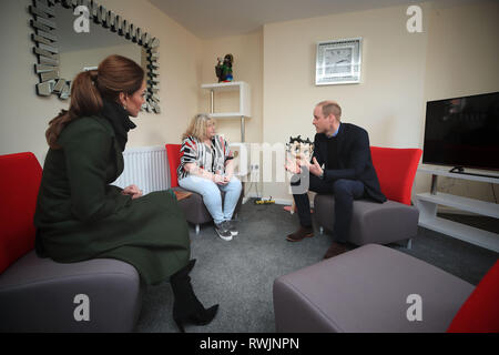 The Duke and Duchess of Cambridge meet Christina Jackson (centre) in her house during a visit to Kirby Road in Blackpool, to talk about the housing problem faced in the town. Stock Photo