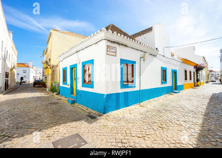 White  and blue traditional portuguese house in Tavira, Algarve, Portugal Stock Photo