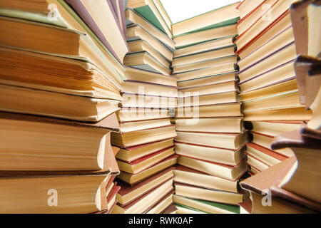 Large books pile wide angle side view Stock Photo