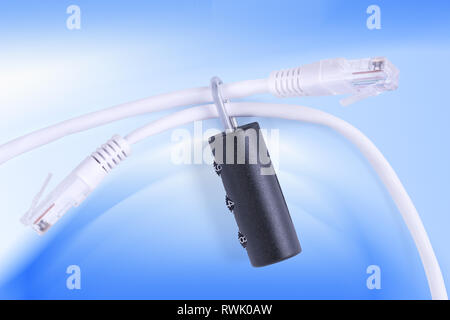 Two network cables bind with combination lock. On abstract blue background, clipping path included Stock Photo