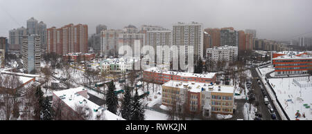 Moscow under snow, city landscape of residential district with high-rise, bird's view Stock Photo