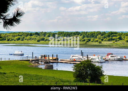 Boats in a harbour, Clonmacnoise; County Offaly, Ireland Stock Photo