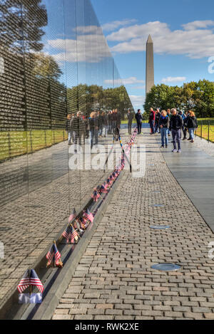 People at the Wall, Vietnam Veterans Memorial; Washington D.C., United States of America Stock Photo