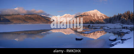 Winter afternoon along the shoreline of Mendenhall River, Tongass National Forest; Juneau, Alaska, United States of America Stock Photo