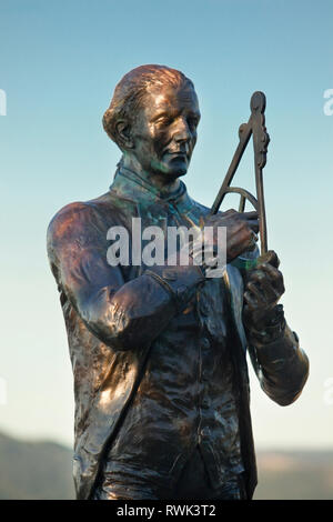 Bronze statue of Captain James Cook at the monument bearing the same name, which itself is a National Historic Site on the top of Crow Hill in Corner Brook, Newfoundland, Canada. The sculpture is by Luben Boykov and was completed in 2012. Stock Photo