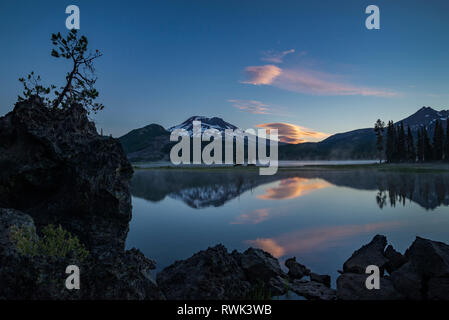 Sparks Lake, South Sister and Broken Top from the Ray Atkeson Memorial Trail; Deschutes National Forest, Oregon. Stock Photo