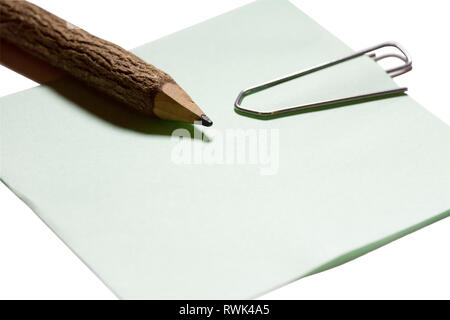 single paper clip with wooden pencil in white background Stock Photo