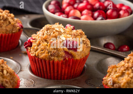 Freshly baked cranberry muffins with oatmeal crumble topping Stock Photo