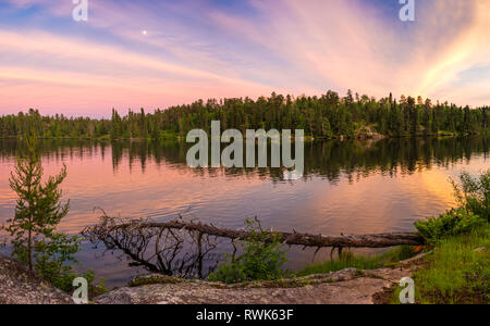 Colorful Sunset on Dogtooth Lake at Rushing River Provincial Park, Ontario, Canada Stock Photo