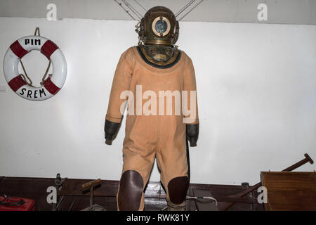 Belgrade, Serbia, March 2019 - Vintage diving helmet and suit made by Siebe Gorman & Company exposed in the Museum of Science and Technology Stock Photo