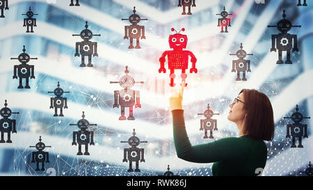 Smiling businesswoman pointing finger up, choosing a different robot. Employee choice, group of artificial intellect replace human, leadership concept Stock Photo