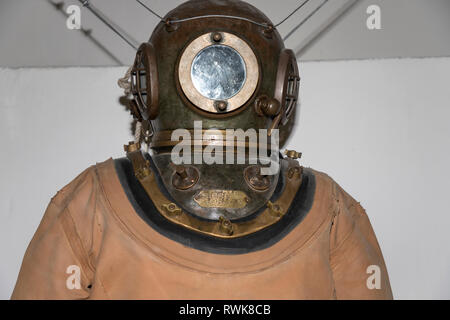 Belgrade, Serbia, March 2019 - Vintage diving helmet and suit made by Siebe Gorman & Company exposed in the Museum of Science and Technology Stock Photo