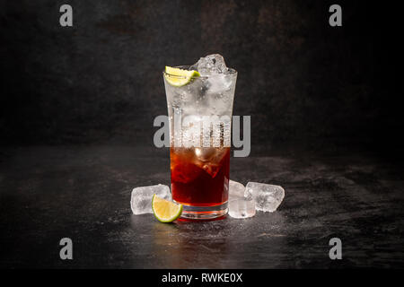 Soda drink with berry syrup and soda with ice cubes Stock Photo