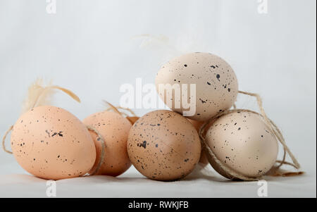 Rustic easter eggs on a white background Stock Photo
