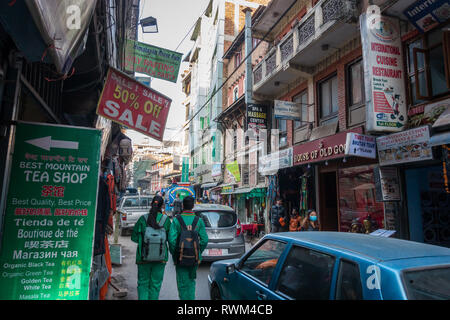 Hustle and bustle in the busy streets of Kathmandu, Nepal, as locals and tourists mixed in the narrow streets. Stock Photo