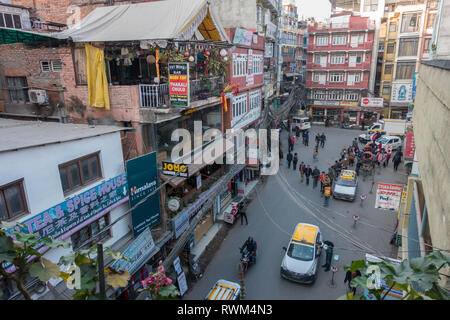 Hustle and bustle in the busy streets of Kathmandu, Nepal, as locals and tourists mixed in the narrow streets. Stock Photo