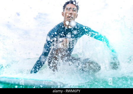 Surfer in action, Pagudpud, Ilocos Norte, Philippines Stock Photo