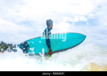 Surfer in action, Pagudpud, Ilocos Norte, Philippines Stock Photo