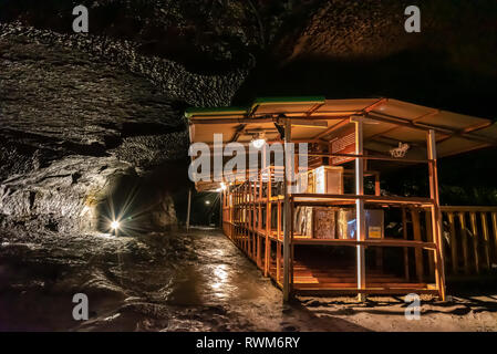 Wind Cave & Ice Cave in Fugaku Japan. The Fuji Fugaku Wind Cave is surrounded by the abundant greenery of the Aokigahara Jukai forest. Once you enter Stock Photo