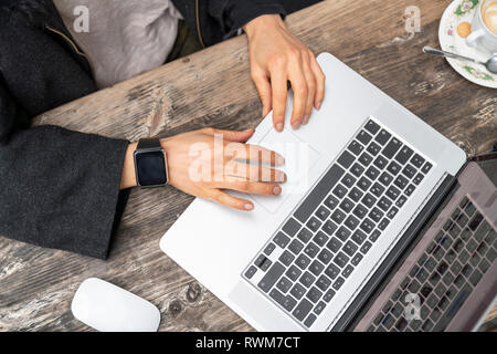 Female freelancer blogger using laptop Stock Photo
