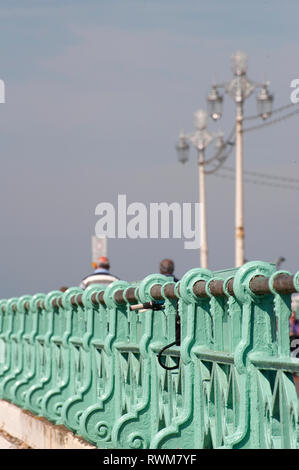 Metal railings on the seafront in the coastal town of Brighton, Sussex, England. Stock Photo