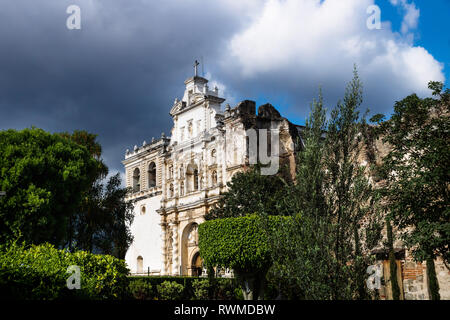 Church of San Fransisco el Grande with dramatic sky with sunshine, Antigua, Guatemala Stock Photo