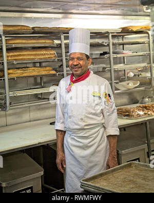 MIAMI, FLORIDA - March 2, 2016: Kitchen staff on cruise ships, including chefs and cooks, work some of the hardest and longest hours as the kitchens a Stock Photo