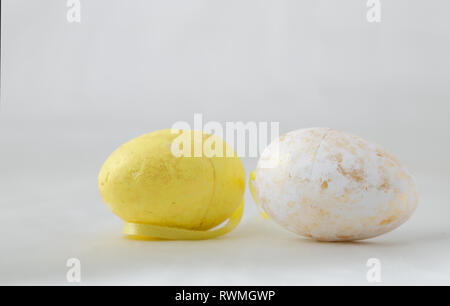 Golden painted easter eggs on  white background Stock Photo