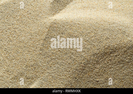 Sand texture as background Stock Photo