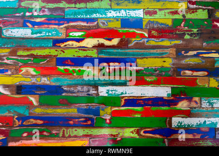 Colorful distressed painted wood surface Stock Photo