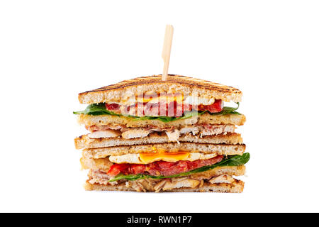 Huge juicy club sandwich with chicken and fried egg on white Stock Photo