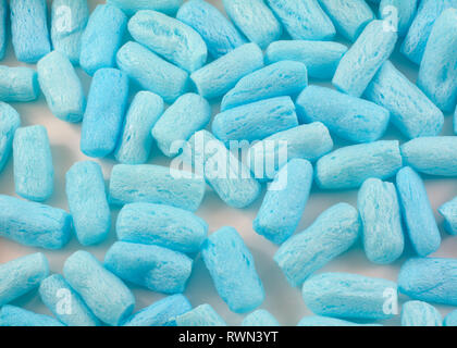 Close up of blue polystyrene foam pellet box filler for shipping fragile items to prevent damage and breakage Stock Photo