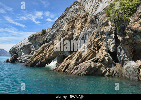Sculpted eroded rocks at the Marble Caves (Capilla de Mármol) on Lago General Carrera, Rio Tranquilo, Aysen, Patagonia, Chile Stock Photo