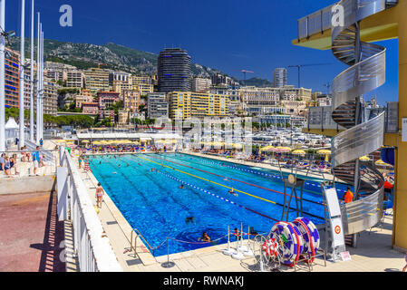 Open air swimming pool in city center of La Condamine, Monte-Carlo, Monaco, Cote d'Azur, French Riviera. Stock Photo