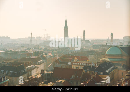 February 18, 2019. Denmark Copenhagen. Panoramic top view of the city center from a high point. Round Rundetaarn Tower. Stock Photo