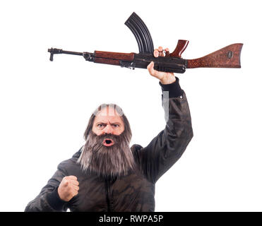 The bearded man rise kalashnikov isolated on a white background. Emotional warrior screaming with automatic weapon. Stock Photo