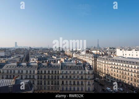 Paris, France - March 15, 2016: Cityscape skyline aerial view on a clear day from the Printemps mall terrace Stock Photo