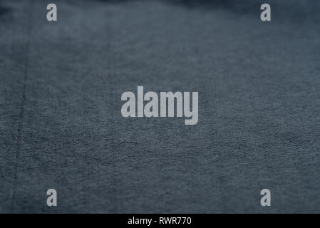 dark gray color felt backgroun texture  selective focus Stock Photo
