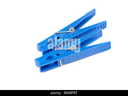 Blue plastic clothespins isolated on white background Stock Photo