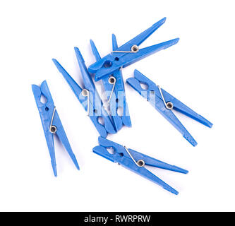 Blue plastic clothespins isolated on white background Stock Photo