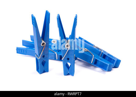 Blue plastic clothespins isolated on white background Stock Photo