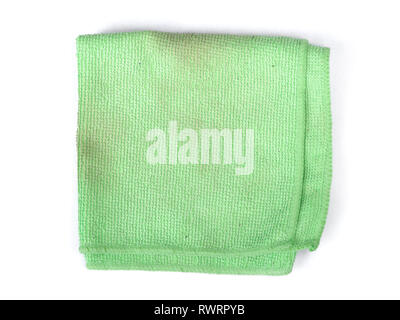 Folded green microfiber cloth isolated on white background Stock Photo