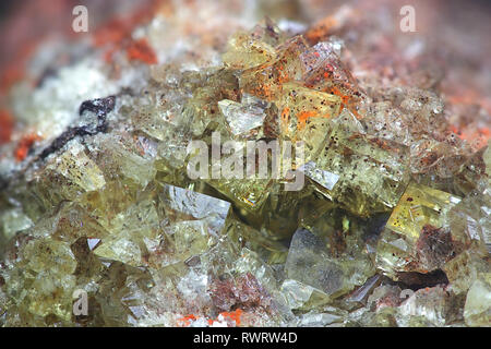 Crystals of fluorite with hematite inclusions from Illo calcite quarry in Finland Stock Photo