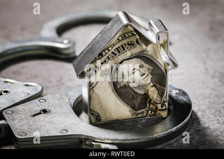 Human greed or the concept on fraud of currency transactions with the real estate Stock Photo
