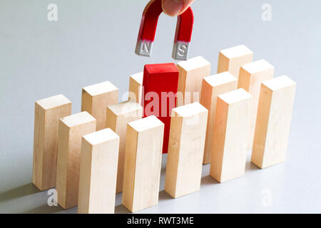 Looking for an employee  abstract business recruitment concept with magnet Stock Photo
