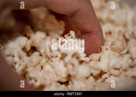 Handful of popcorn Stock Photo